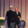 Lance welcomes President Bill Clinton. Darn focus...